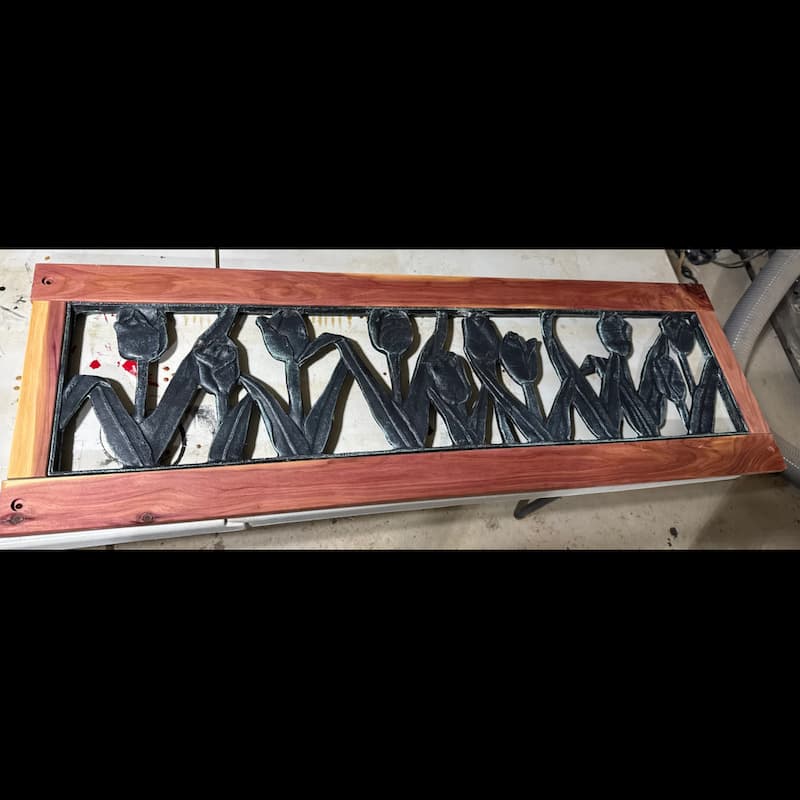 Antique bench repair with cedar wood replacement around iron backing