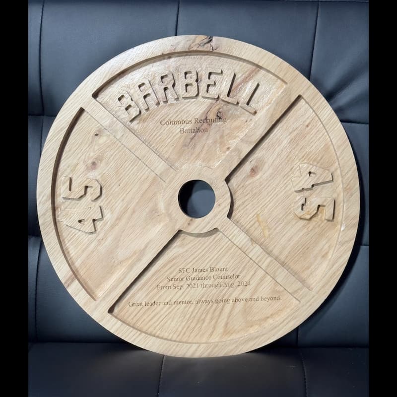 Custom maple 45-lb plate design with engraving