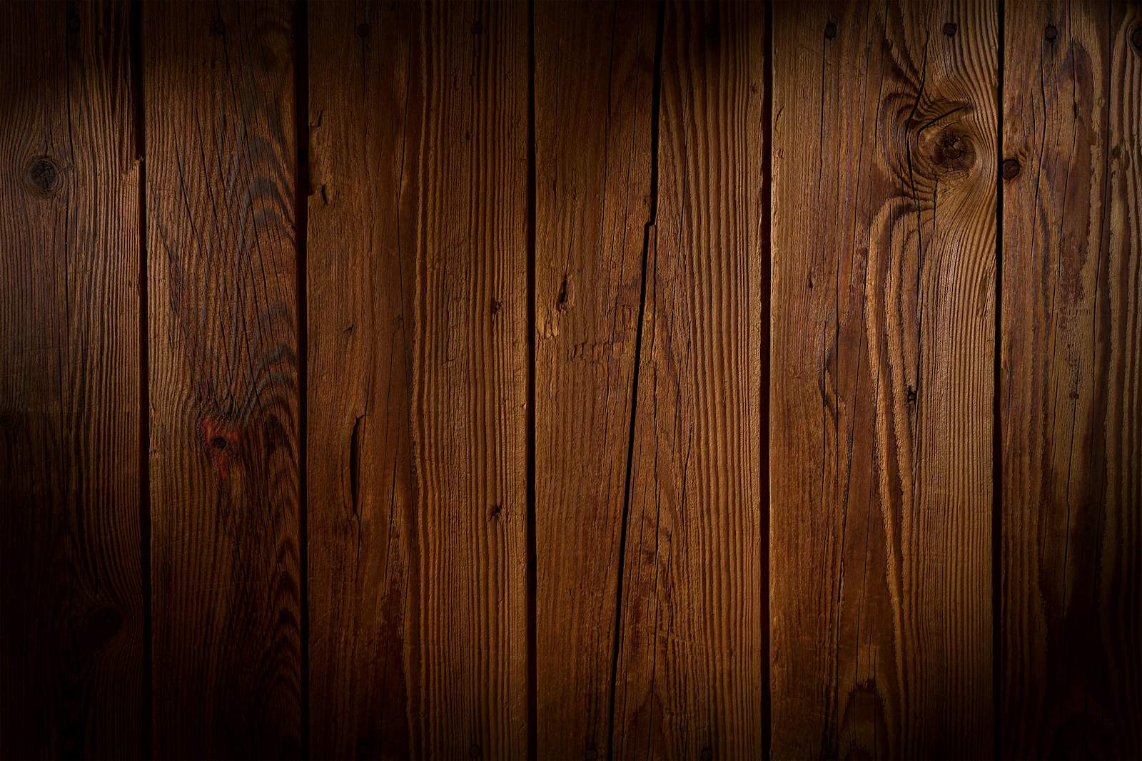 Warm wood-grain backdrop behind TNF Wood Work hero